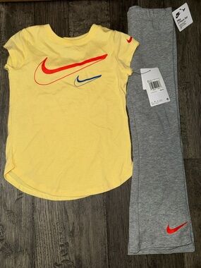 Nike Yellow Tee and Gray Leggings Set with Red & Blue Swooshes
